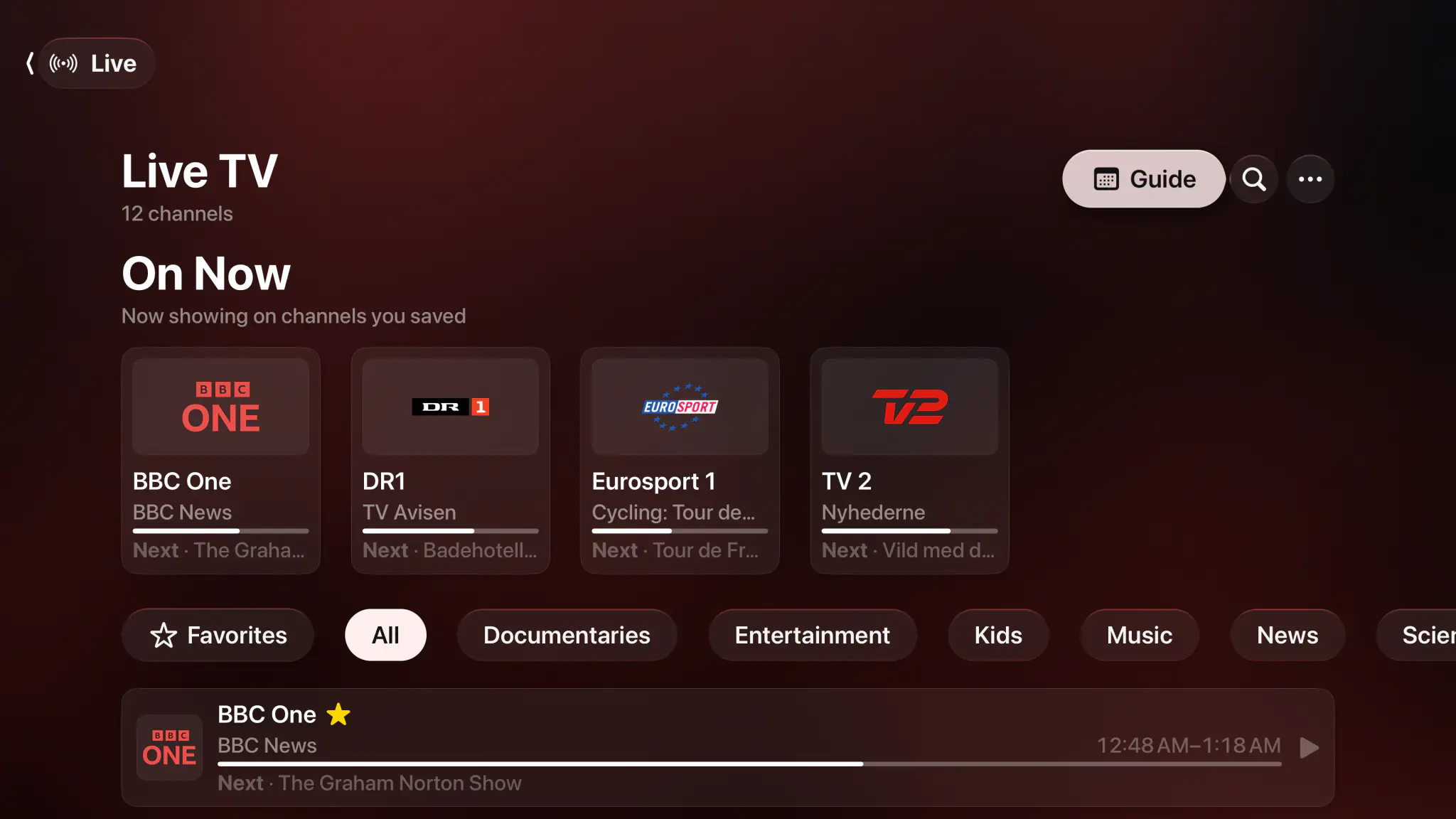 Spectati Live TV screen with an On Now row, category filters and channel rows showing now, next and live progress